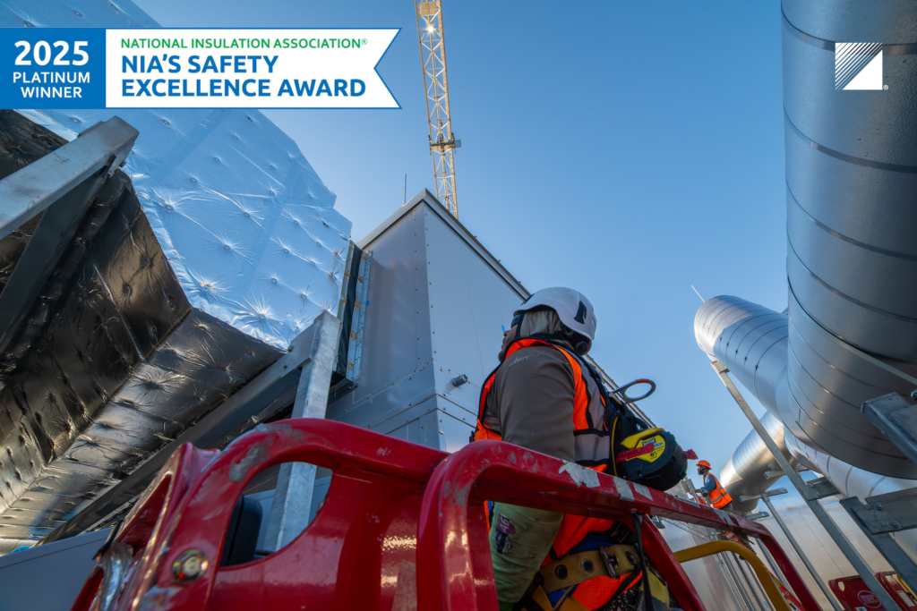 NIA Award badge, PCI cube, and workers inspecting insulation